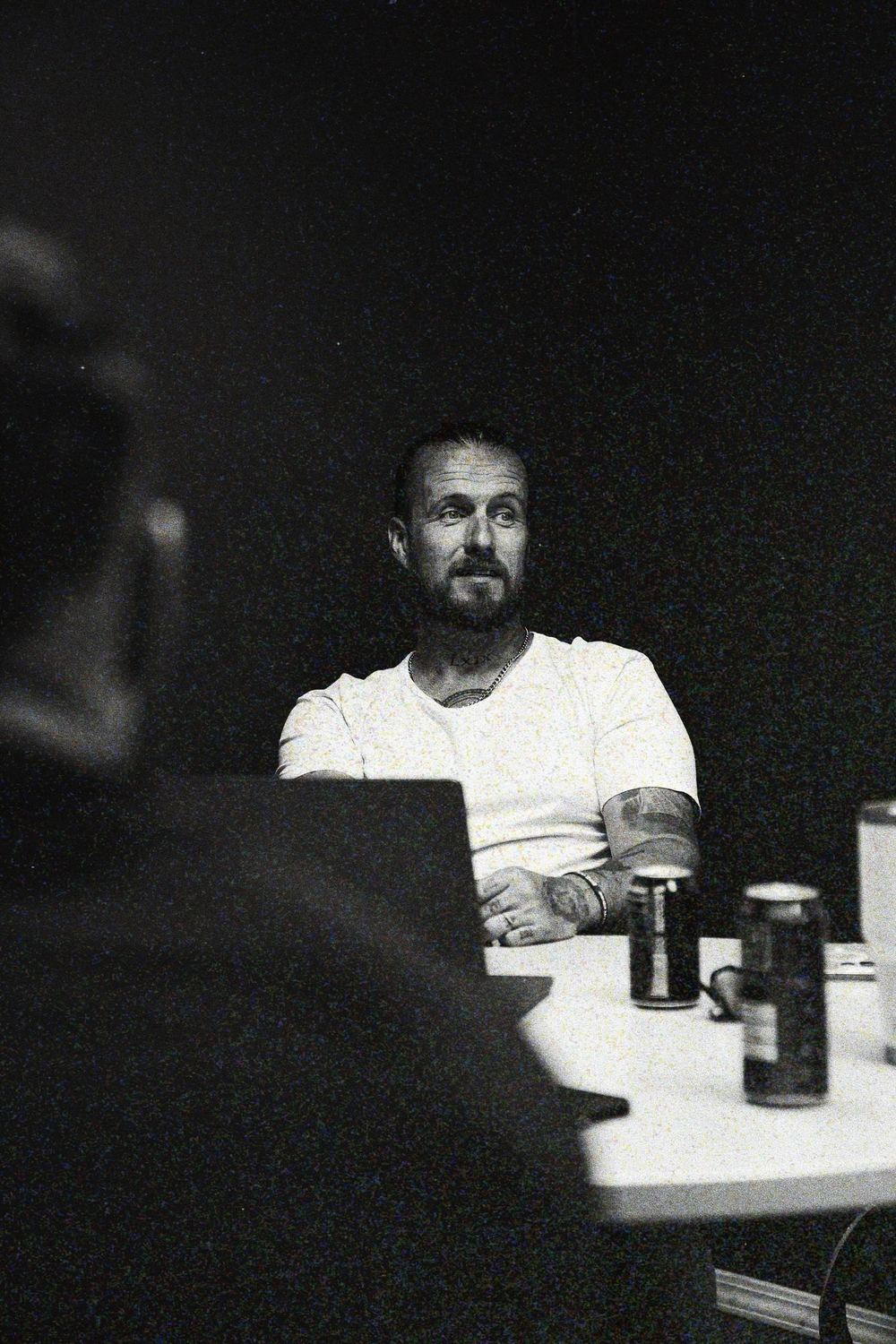 Corey Jeppesen at the table in a bahlr meeting