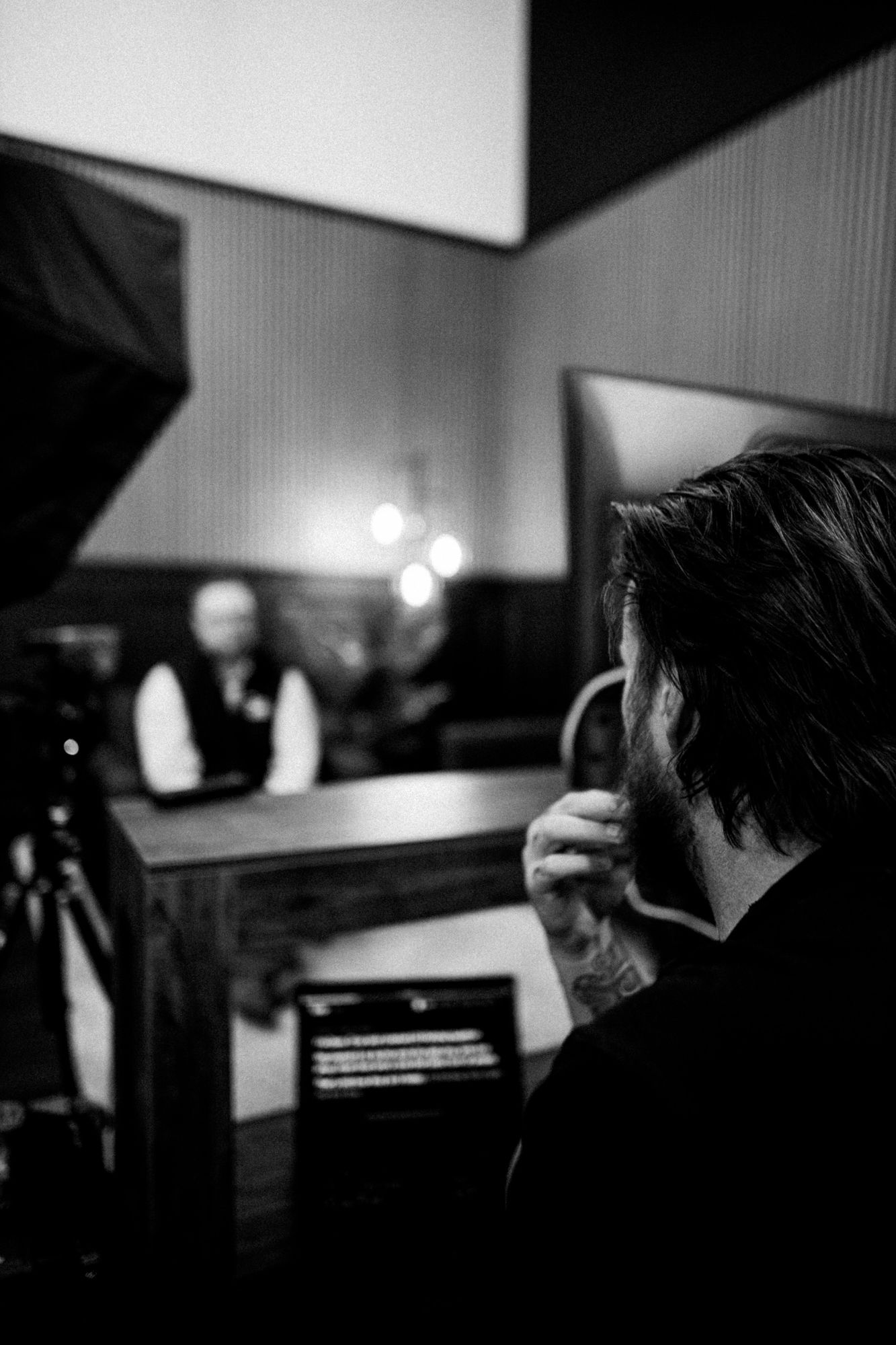 Corey Jeppesen listening in on an interview shoot at the bahlr studio
