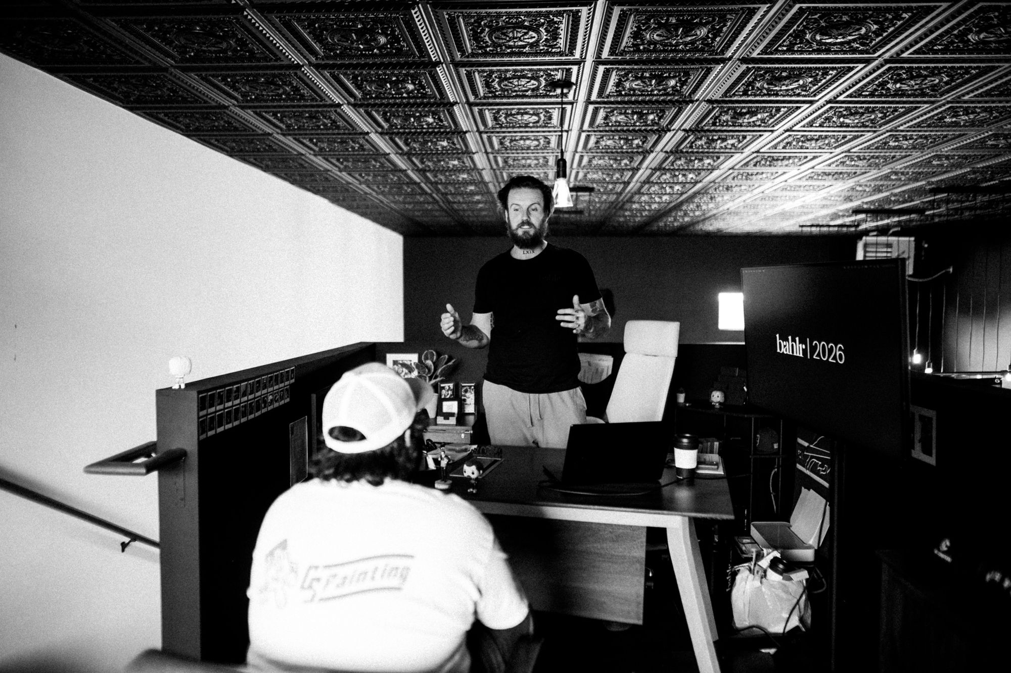 Corey Jeppesen, founder of bahlr, talking with clients at the bahlr studio